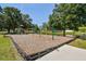 Community playground with swings and playset at 9708 Little Pond Way, Tampa, FL 33647