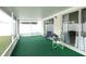 Bright screened patio with access to the house at 9708 Little Pond Way, Tampa, FL 33647