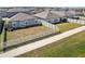 Aerial view of homes and community at 9835 Lemon Drop Loop, Sun City Center, FL 33573