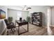 Home office with desk, chair, and built-in shelving at 9835 Lemon Drop Loop, Sun City Center, FL 33573