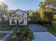 Modern farmhouse exterior with landscaped yard and driveway at 1150 7Th N St, St Petersburg, FL 33701