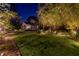 Stunning house exterior at night with landscape lighting at 1150 7Th N St, St Petersburg, FL 33701