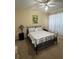 Bedroom with a metal bed frame and window at 1228 S Missouri Ave # 609, Clearwater, FL 33756