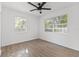 Spacious bedroom with wood-look floors and dual windows at 205 7Th Sw Ave, Largo, FL 33770