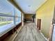 Under renovation, features new grey wood-look floor tile at 311 80Th Ne Ave, St Petersburg, FL 33702