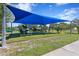 Outdoor fitness area with covered workout equipment at 311 80Th Ne Ave, St Petersburg, FL 33702