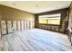 Renovation in progress, features new grey wood-look floor tile at 311 80Th Ne Ave, St Petersburg, FL 33702