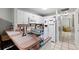 Kitchen boasts ample counter space and white cabinetry at 3334 W Heiter St, Tampa, FL 33607