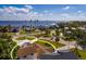 Aerial view of a waterfront property with a house and surrounding landscape at 3406 Bayshore Ne Blvd, St Petersburg, FL 33703