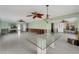 Open living room with kitchen access and water views at 405 Harbor S Dr, Indian Rocks Beach, FL 33785