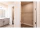 Bathroom with vanity, toilet, and walk-in closet at 411 Seasons Dr, Punta Gorda, FL 33983