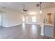 Open living room with tile floors and neutral walls at 411 Seasons Dr, Punta Gorda, FL 33983