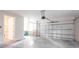 Attached garage with automatic opener and ample space at 411 Seasons Dr, Punta Gorda, FL 33983