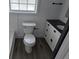 Bathroom featuring a new vanity with dark countertop and new toilet at 301 W Chelsea St, Tampa, FL 33603