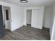 Bedroom with new flooring and closet offers plenty of natural light at 301 W Chelsea St, Tampa, FL 33603