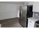 A kitchen featuring stainless steel appliances and modern white cabinets at 301 W Chelsea St, Tampa, FL 33603