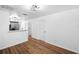 Bright hallway with wood flooring and neutral walls at 3330 W Heiter St, Tampa, FL 33607