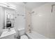 Clean bathroom with a bathtub, shower, and updated vanity at 3330 W Heiter St, Tampa, FL 33607
