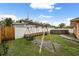 Large backyard with swing set and above ground pool at 3336 W Heiter St, Tampa, FL 33607