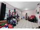 Living room with tiled floors and decorative items at 3336 W Heiter St, Tampa, FL 33607
