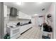Bright kitchen features white cabinets, and modern appliances at 3336 W Heiter St, Tampa, FL 33607