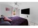 Bedroom with king bed and large TV at 3336 W Heiter St, Tampa, FL 33607