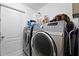 Bright laundry room, features a washer and dryer at 3336 W Heiter St, Tampa, FL 33607