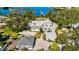 Home with detached garage and lush landscaping at 518 Riverside Dr, Tarpon Springs, FL 34689