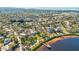 Wide aerial showcasing home's waterfront location at 518 Riverside Dr, Tarpon Springs, FL 34689