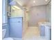Spa-like bathroom with soaking tub, walk-in shower, and double vanity at 518 Riverside Dr, Tarpon Springs, FL 34689