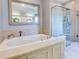 Bathroom with large soaking tub and walk-in shower at 518 Riverside Dr, Tarpon Springs, FL 34689