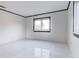 Bright bedroom with white walls and hardwood floors at 518 Riverside Dr, Tarpon Springs, FL 34689