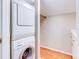 Laundry room with stackable washer and dryer at 518 Riverside Dr, Tarpon Springs, FL 34689