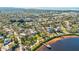 Gorgeous neighborhood with mature trees, lush landscaping, and beautiful waterfront views at 518 Riverside Dr, Tarpon Springs, FL 34689
