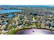 Upscale neighborhood with mature trees, lush landscaping, and beautiful waterfront views at 518 Riverside Dr, Tarpon Springs, FL 34689