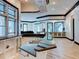 Gourmet kitchen features granite countertops, a stainless sink, and white cabinetry at 518 Riverside Dr, Tarpon Springs, FL 34689