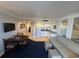 Open concept living area with a sofa, dining area, and galley kitchen at 5500 Gulf Blvd # 2235, St Pete Beach, FL 33706