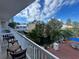 Relaxing balcony view overlooking a courtyard with water features at 5500 Gulf Blvd # 2237, St Pete Beach, FL 33706