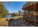 Picturesque backyard features lush greenery, waterfront views, and a screened porch for outdoor relaxation at 7176 Westwind St, Weeki Wachee, FL 34607