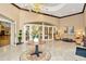 Elegant clubhouse lobby with seating area and chandelier at 11390 Deercroft Ct, Spring Hill, FL 34609