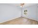 Bedroom with hardwood floors, a ceiling fan and a window with garden view at 1815 E 22Nd Ave, Tampa, FL 33605