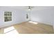 Spacious bedroom featuring hardwood floors and ample natural light at 1815 E 22Nd Ave, Tampa, FL 33605