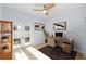 Bedroom with hardwood floors, french doors and a workspace setup at 1815 E 22Nd Ave, Tampa, FL 33605