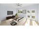 Living room featuring hardwood floors, french doors and comfortable furnishings at 1815 E 22Nd Ave, Tampa, FL 33605