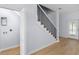 Staircase with black metal railing leading to the second floor at 1815 E 22Nd Ave, Tampa, FL 33605