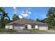 Modern two-car garage home with a lovely front yard at 2004 Sidney St, Clearwater, FL 33763