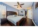 Bright bedroom featuring a ceiling fan and ample closet space at 2739 Sherbrooke Ln # B, Palm Harbor, FL 34684