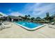 Refreshing community pool with ample lounge chairs at 2739 Sherbrooke Ln # B, Palm Harbor, FL 34684