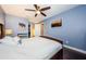 Spacious bedroom with wood floors and ceiling fan at 2739 Sherbrooke Ln # B, Palm Harbor, FL 34684