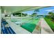 Community shuffleboard courts with benches at 2739 Sherbrooke Ln # B, Palm Harbor, FL 34684